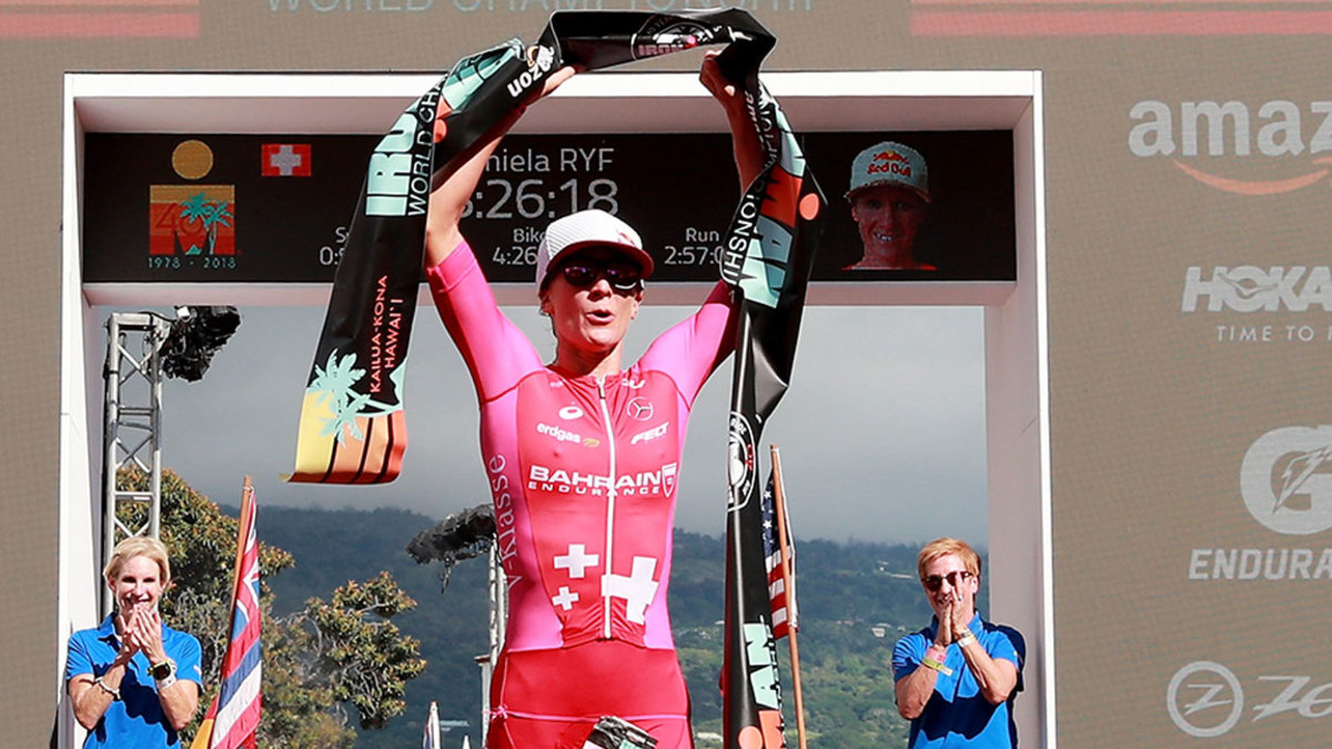 Daniela Ryf of Switzerland celebrates after setting the course record of 8:26:16 to win the IRONMAN World Championships brought to you by Amazon on October 13, 2018 in Kailua Kona, Hawaii. (Photo by Al Bello/Getty Images for IRONMAN)