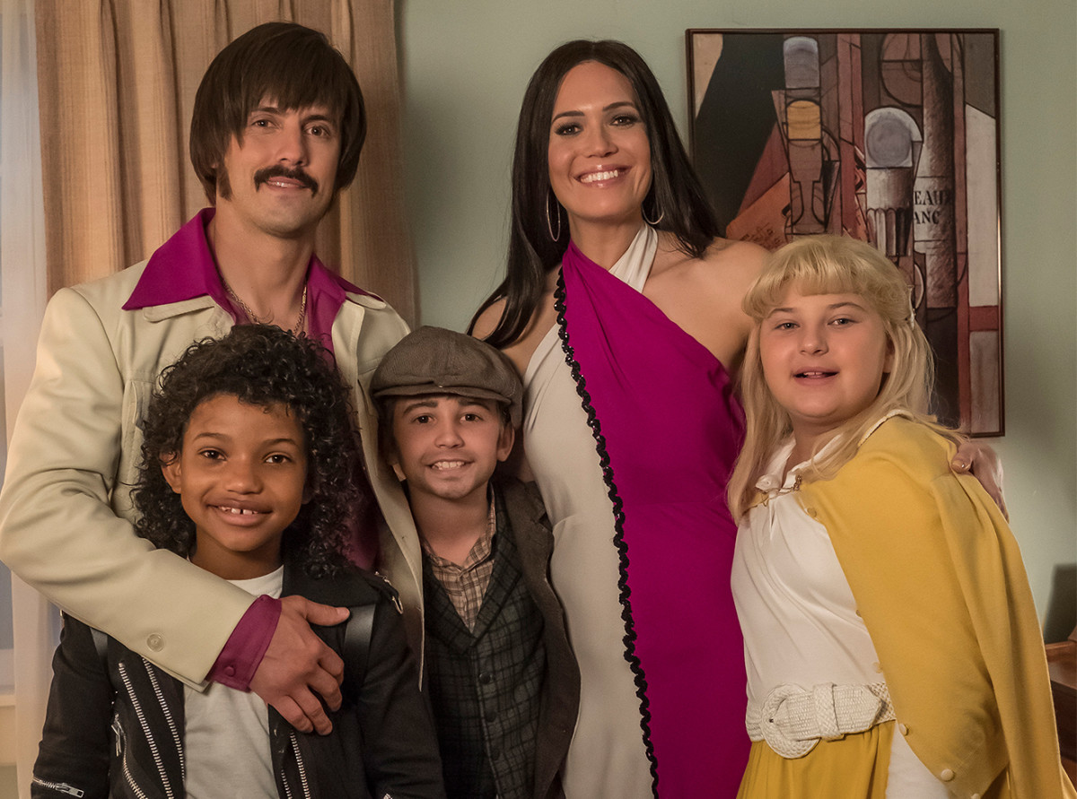 Ventimiglia (upper left) channels his inner Sonny Bono as Jack Pearson on This is Us, co-starring (clockwise from upper right) Mandy Moore, Mackenzie Hancsicsak, Parker Bates, and Lonnie Chavis
