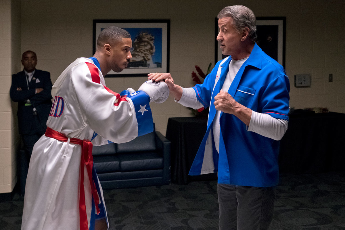 Michael B. Jordan stars as Adonis Creed with Sylvester Stallone, Dolph Lundgren, Florian Munteanu, and Tessa Thompson / Barry Wetcher / Metro Goldwyn Mayer Pictures / Warner Bros. Pictures