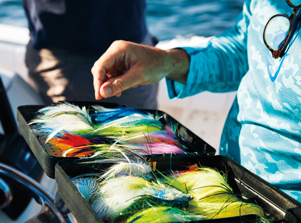 Selecting lures in the early morning light.