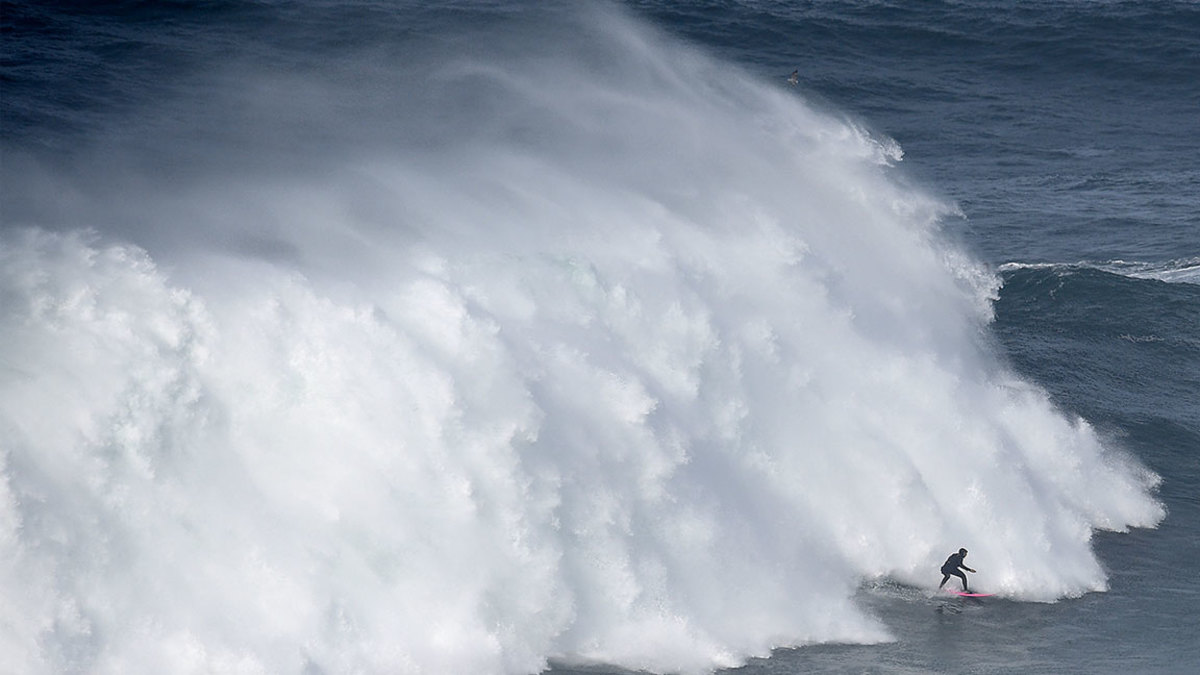 Brazilian big wave surfer Maya Gabeira drops a wave during a surf session at Praia do Norte in Nazare on October 21, 2017. / AFP PHOTO / FRANCISCO LEONG (Photo credit should read FRANCISCO LEONG/AFP/Getty Images)