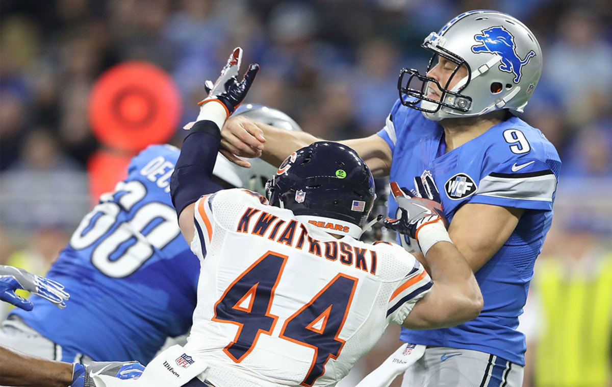 Quarterback Matthew Stafford #9 of the Detroit Lions is hit by Nick Kwiatkoski #44 of the Chicago Bears during second quarter action at Ford Field on December 11, 2016 in Detroit, Michigan. (Photo by Leon Halip/Getty Images)