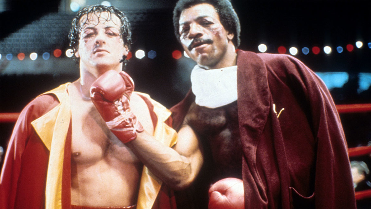 Sylvester Stallone and Carl Weathers on set of the film 'Rocky', 1976. (Photo by United Artists/Getty Images)