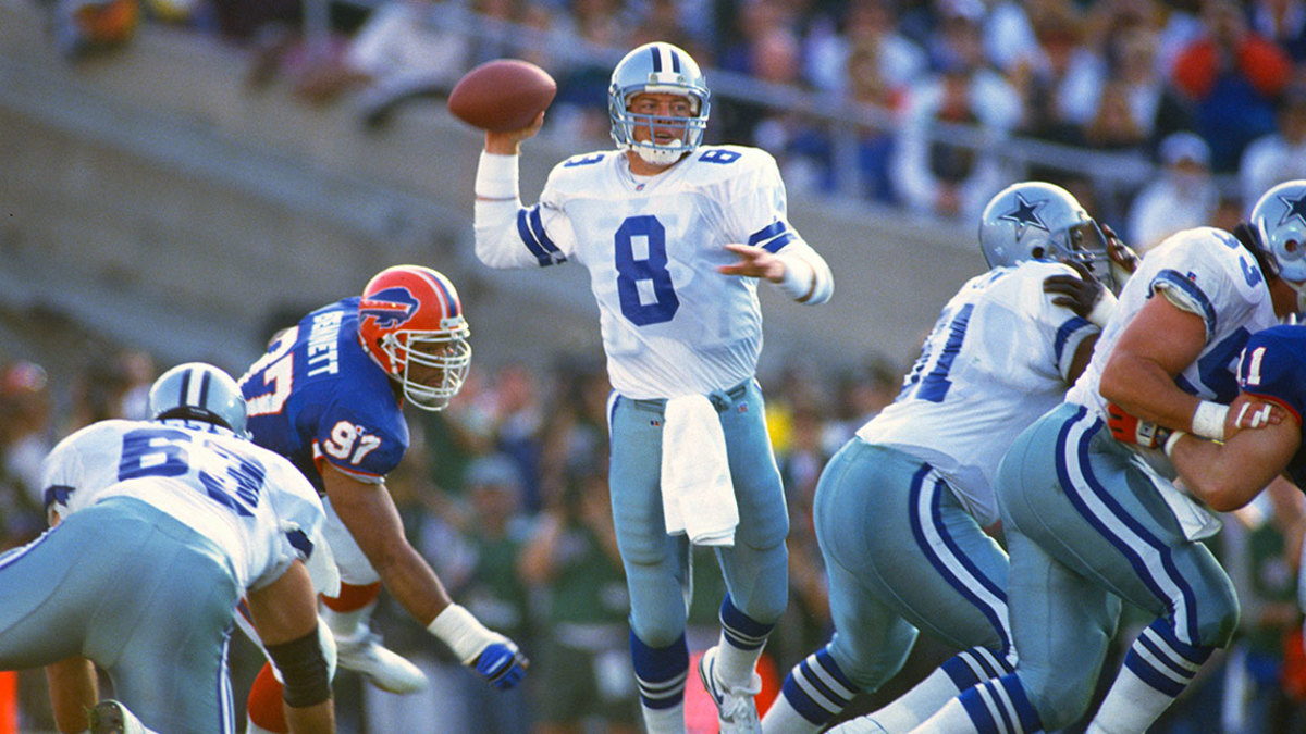 Troy Aikman #8 of the Dallas Cowboys drops back to pass against the Buffalo Bills during Super Bowl XXVII on January 31, 1993 at The Rose Bowl in Pasadena, California. The Cowboys won the Super Bowl 52-17. (Photo by Focus on Sport/Getty Images)