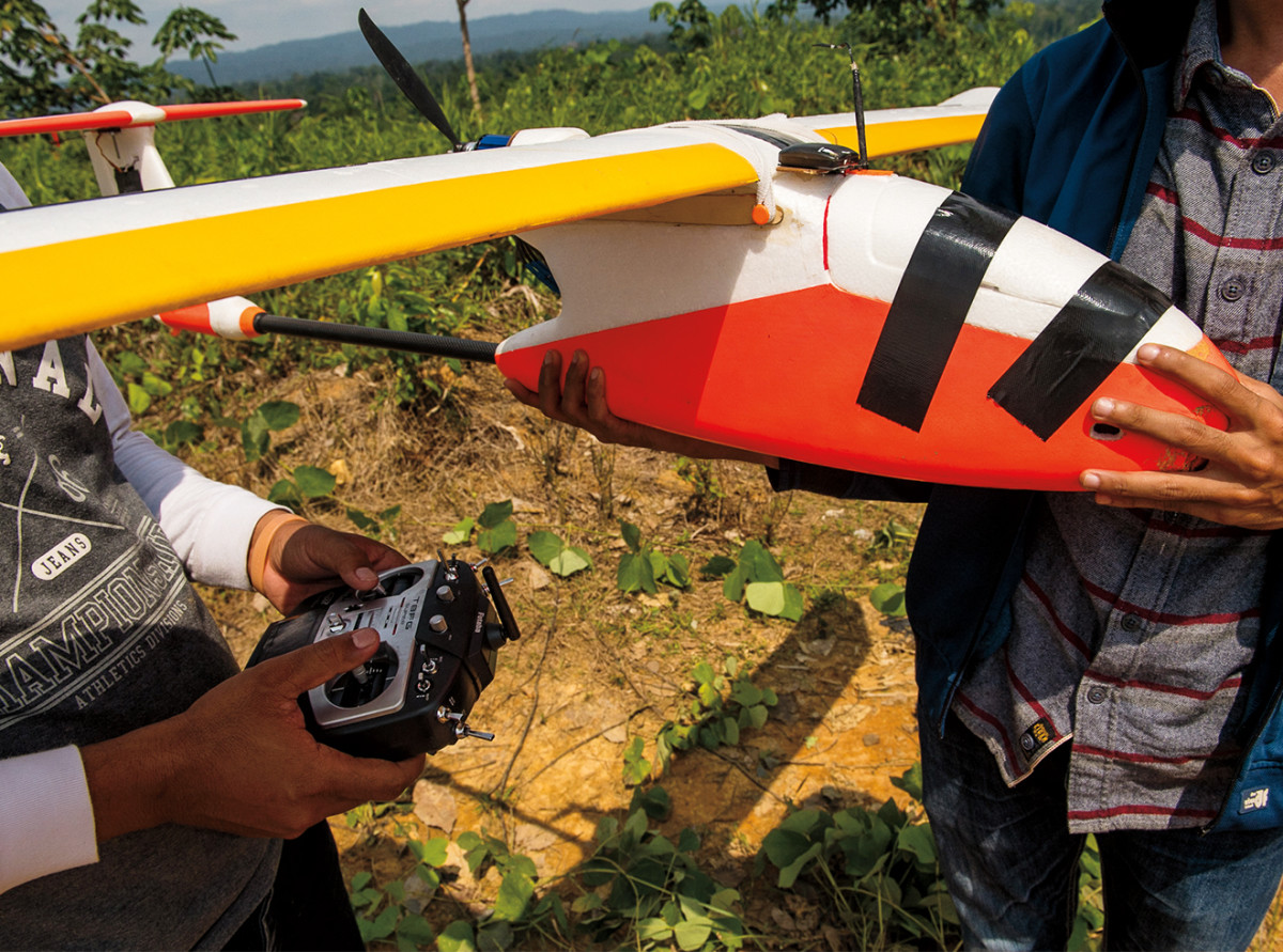 The group uses drones to document illegal oil-palm operations.