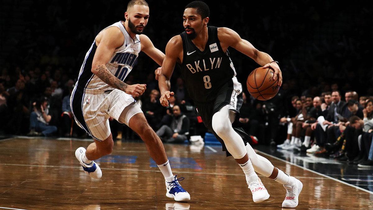 Spencer Dinwiddie #8 of the Brooklyn Nets drives against Evan Fournier #10 of the Orlando Magic during their game at the Barclays Center on January 23, 2019 in New York City. Al Bello/Getty Images