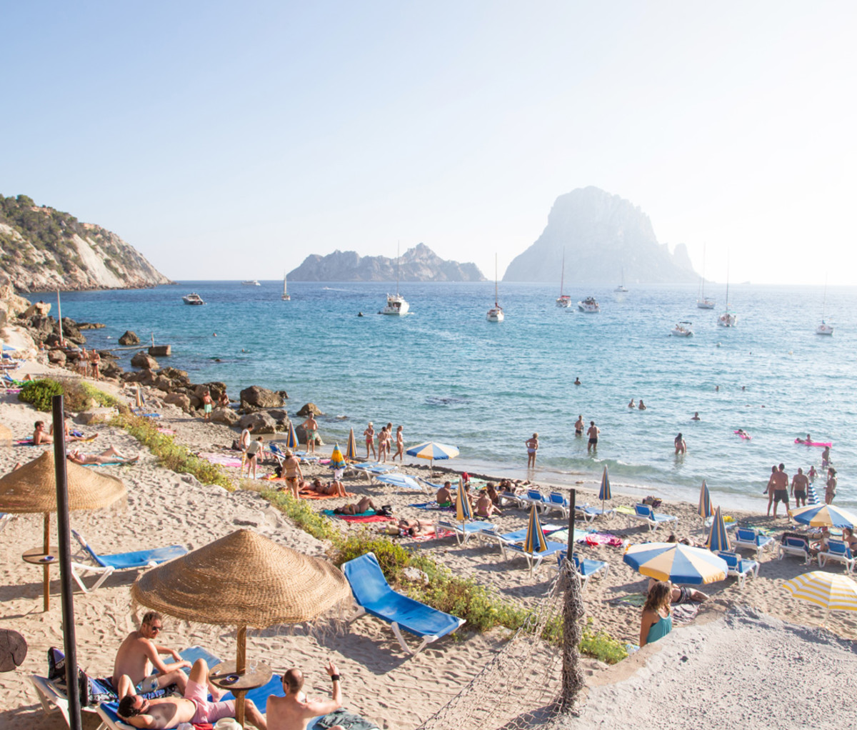 Cala d'Hort in Ibiza island with the island natural reserve of Es Vedrà and Es Vedranell on the background