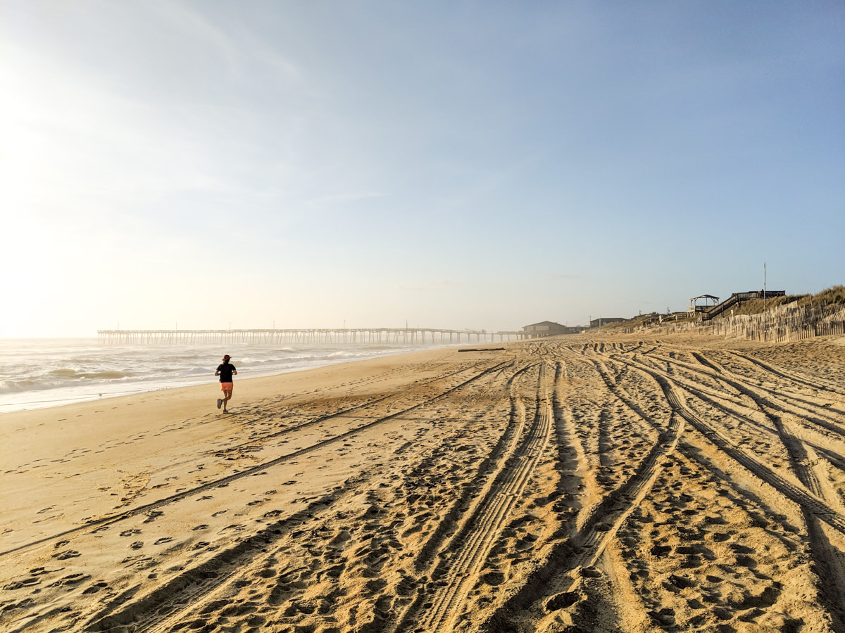 photo of a runner on the beach in Nags Head