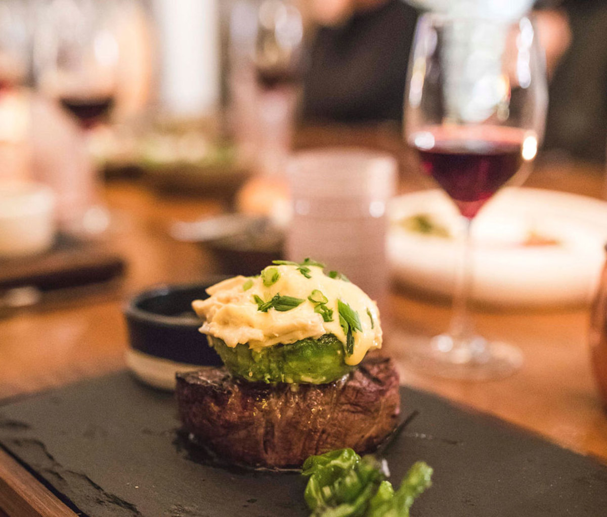 NY Strip with grilled avocado and crab Oscar
