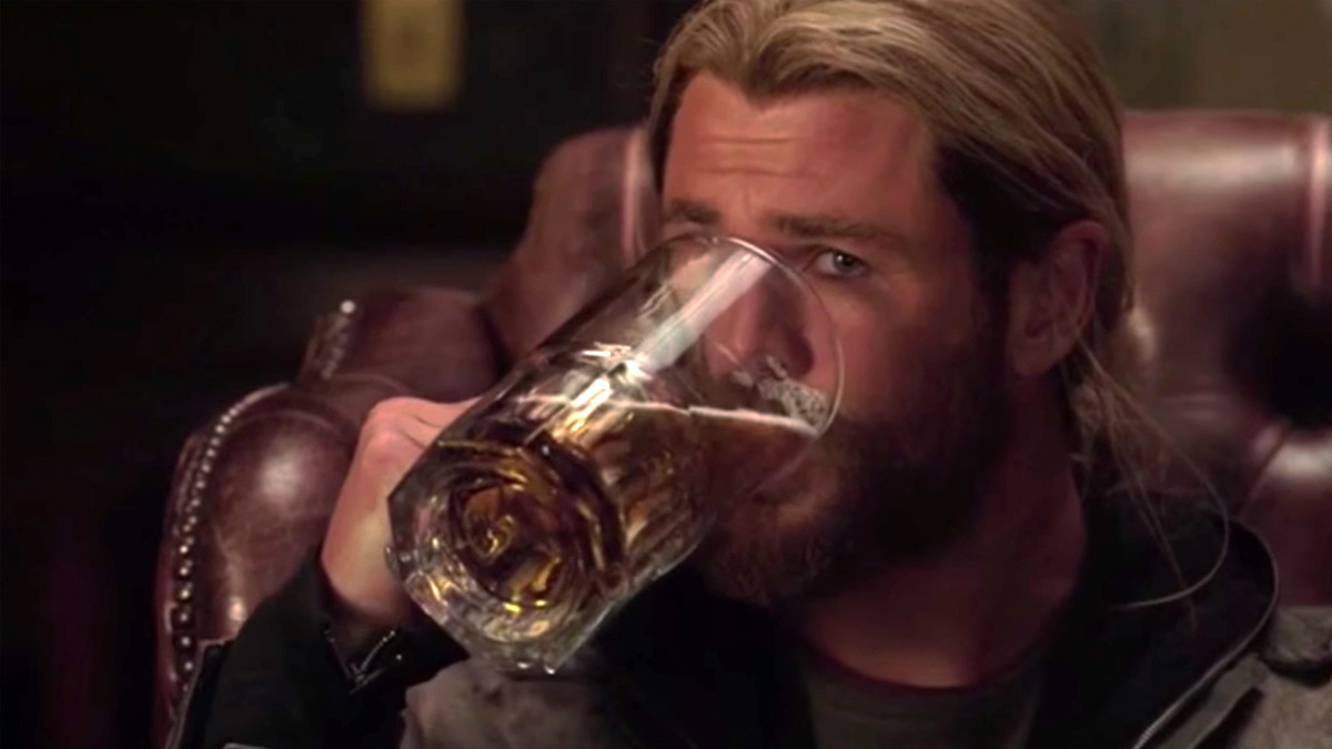 Chris Hemsworth as Thor, drinking beer in Thor: Ragnarok