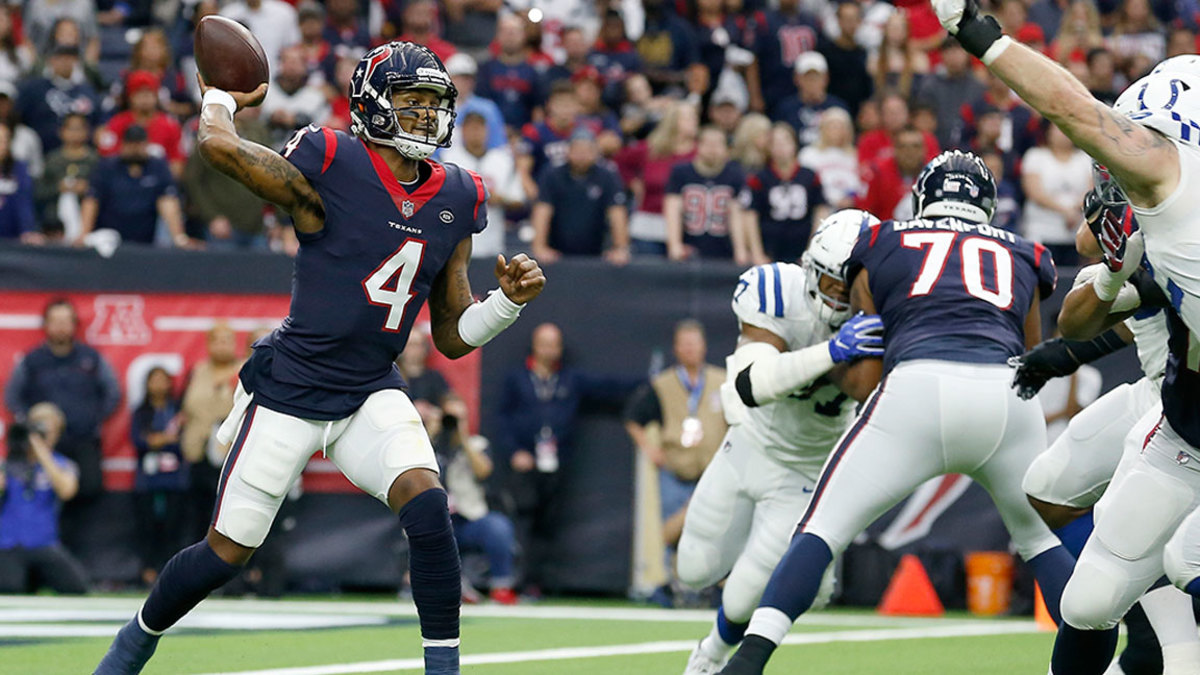HOUSTON, TX - JANUARY 05: Deshaun Watson #4 of the Houston Texans looks to pass under pressure by Margus Hunt #92 of the Indianapolis Colts in the second quarter during the Wild Card Round at NRG Stadium on January 5, 2019 in Houston, Texas. (Photo by Tim Warner/Getty Images)