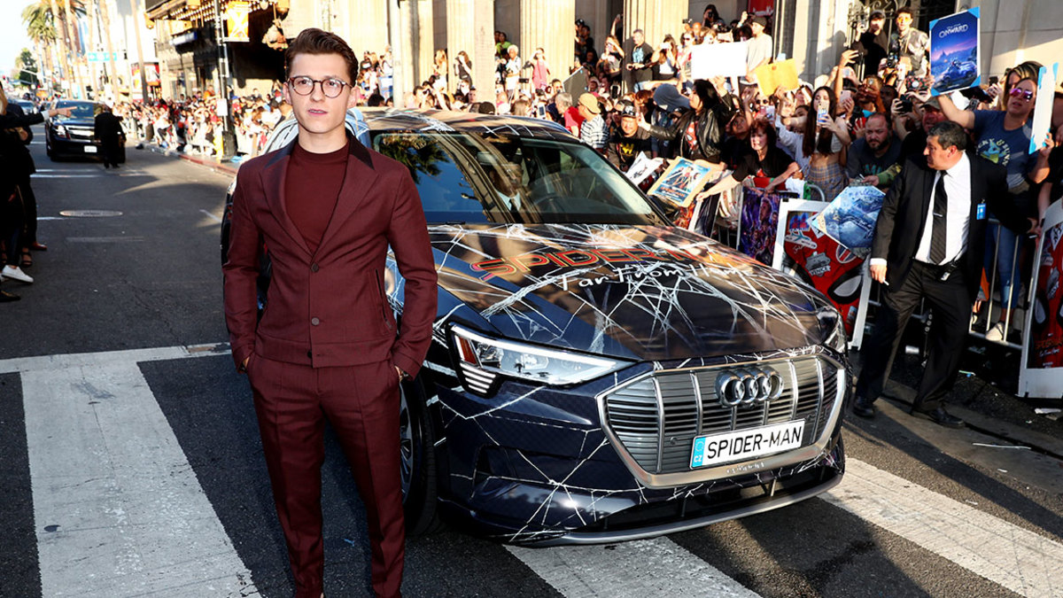 Audi At The World Premiere Of 'Spider-Man: Far From Home' Description - LOS ANGELES, CALIFORNIA - JUNE 26: Tom Holland arrives in a custom Spider-Man Audi e-tron SUV at the World Premiere of Spider-Man: Far From Home at the TCL Chinese Theatre on June 26, 2019 in Hollywood, California. (Photo by Joe Scarnici/Getty Images for Audi)