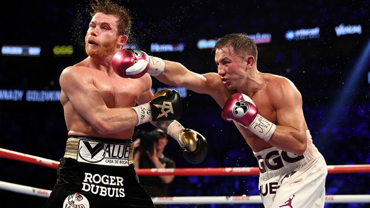 LAS VEGAS, NV - SEPTEMBER 15: Gennady Golovkin punches Canelo Alvarez during their WBC/WBA middleweight title fight at T-Mobile Arena on September 15, 2018 in Las Vegas, Nevada. (Photo by Al Bello/Getty Images)