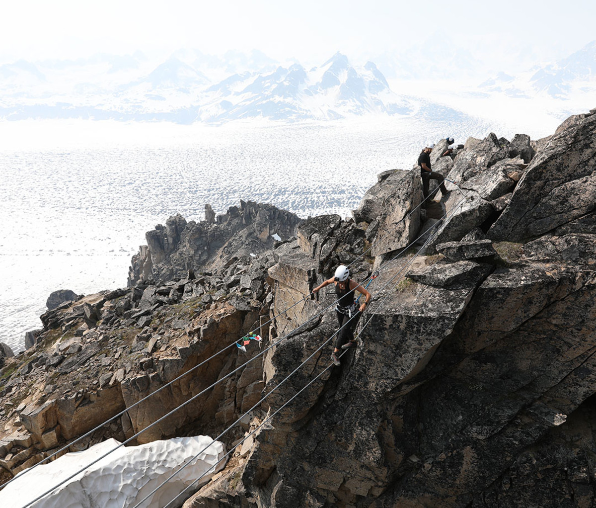 Ashley Mateo on a steel cable bridge