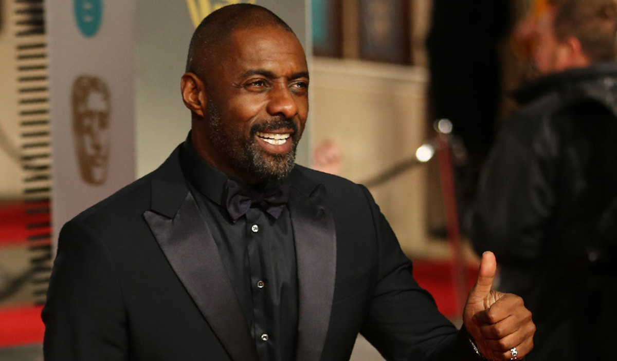 British actor Idris Elba poses on arrival for the BAFTA British Academy Film Awards at the Royal Opera House in London on February 14, 2016. AFP PHOTO / JUSTIN TALLIS / AFP / JUSTIN TALLIS (Photo credit should read JUSTIN TALLIS/AFP/Getty Images)