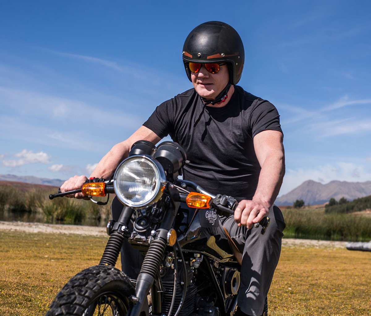 Ramsay on a motorcycle in his new Nat Geo show, "Uncharted"