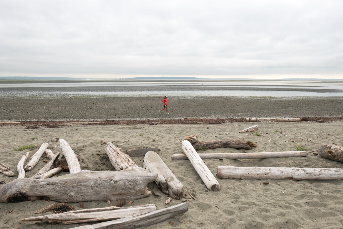 Runner on the beach near Vancouver