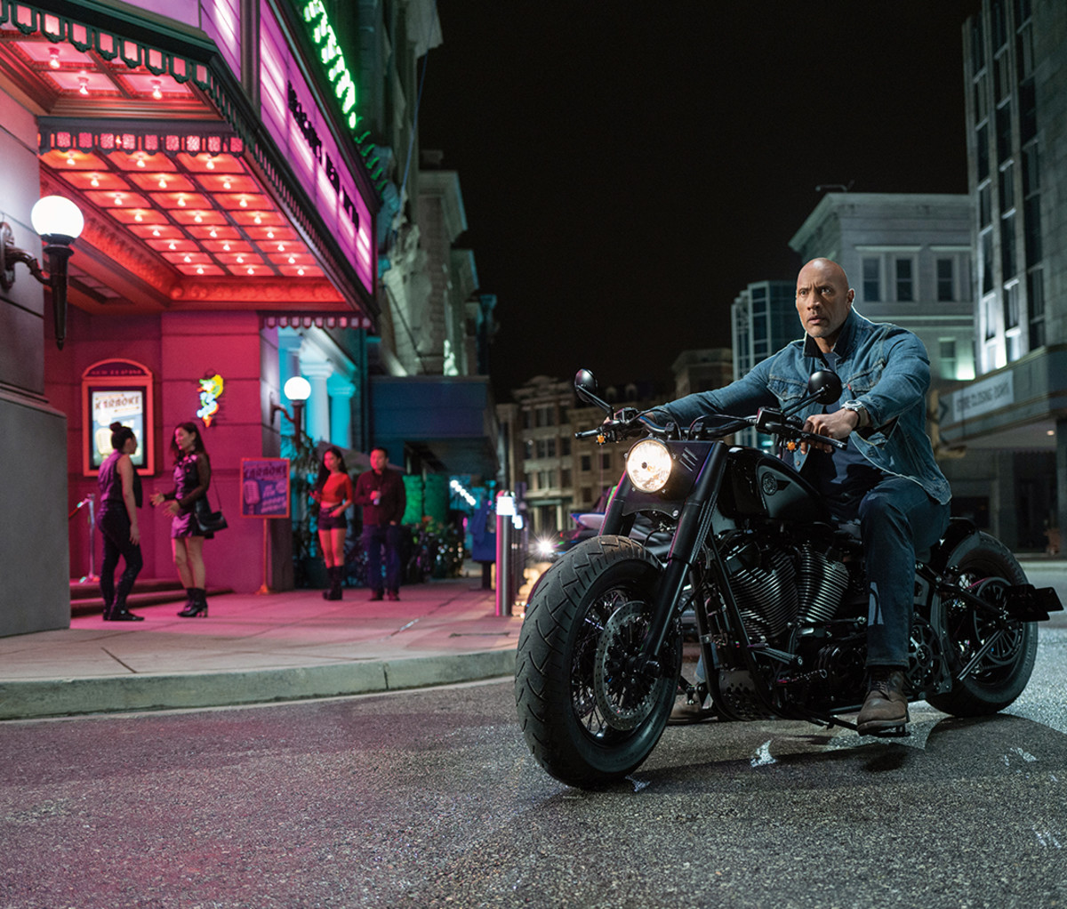 Luke Hobbs (Dwayne Johnson) on a custom Harley Davidson in 