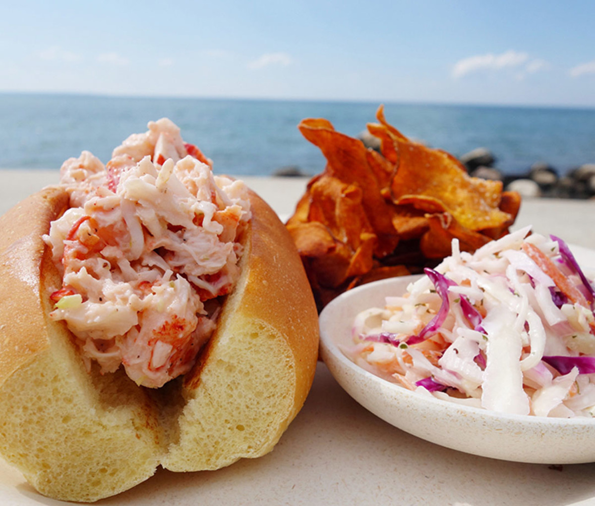 A lobster roll, slaw, and chips from Duryea Lobster Deck in Montauk, NY