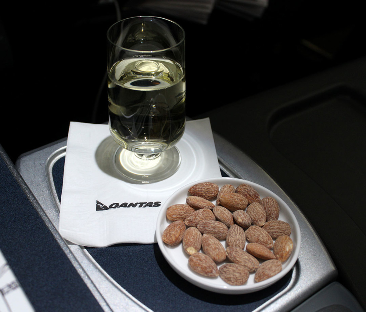 Qantas serves its business class passengers wine and snacks