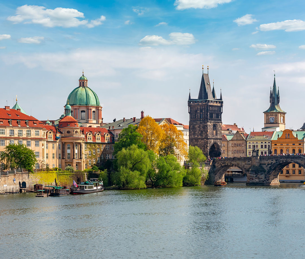 The Vltava river and the Charles bridge beside Old Town Bridge Tower in Prague