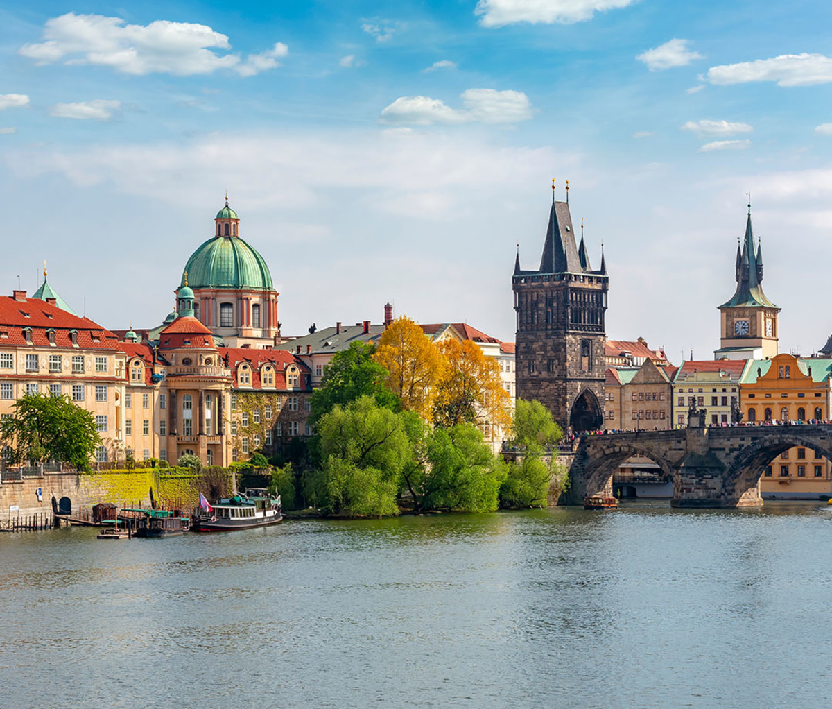 The Vltava river and the Charles bridge beside Old Town Bridge Tower in Prague