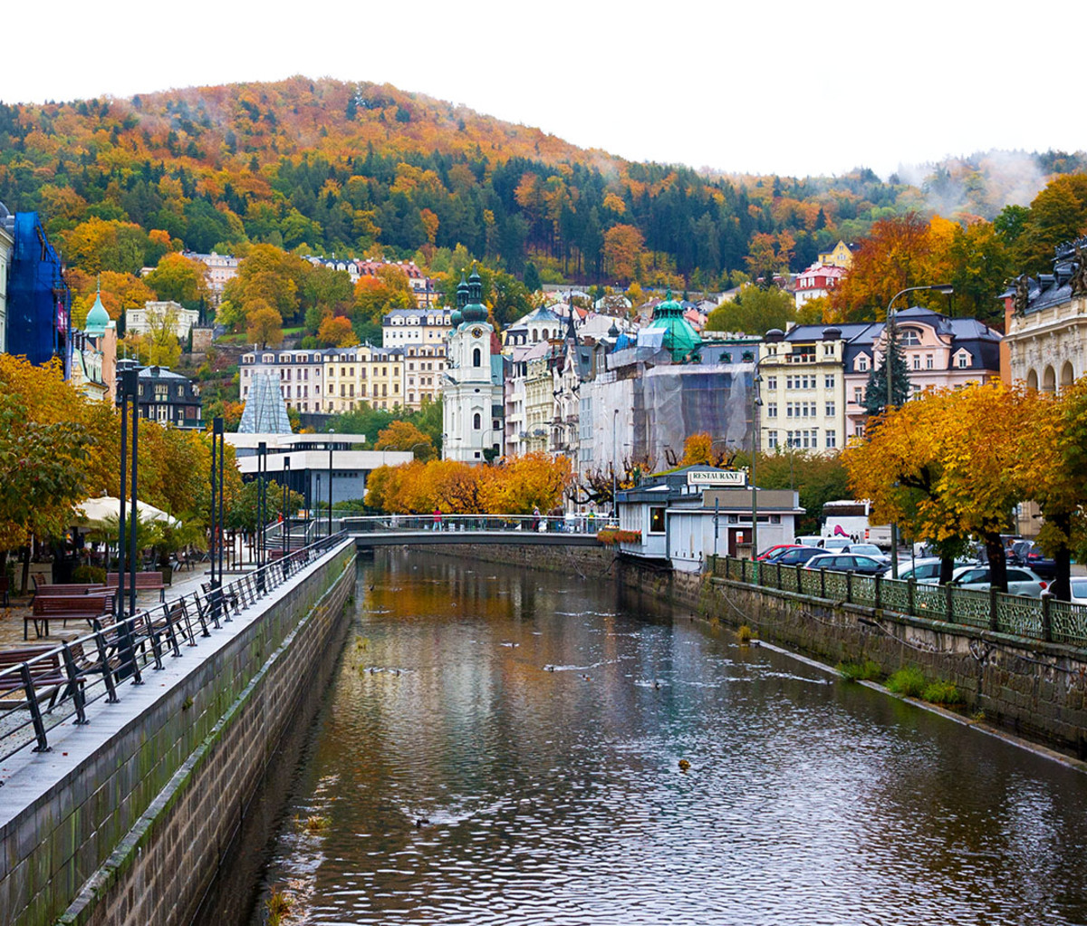 In Karlovy Vary, the embankment of the Tepla river in autumn