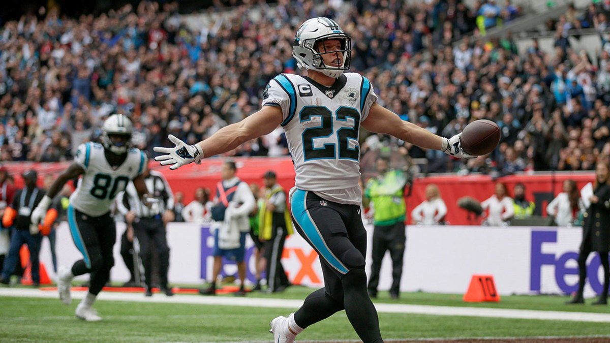 Panthers Buccaneers Football, London, USA - 13 Oct 2019 Carolina Panthers running back Christian McCaffrey (22) reacts after scoring a touchdown against the Tampa Bay Buccaneers during the second quarter of an NFL football game, at Tottenham Hotspur Stadium in London 13 Oct 2019