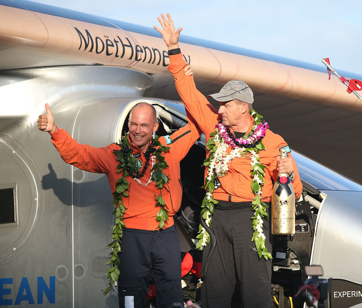 Bertrand Piccard and Andre Borschberg after landing their Solar Impulse 2 in Honolulu, Hawaii