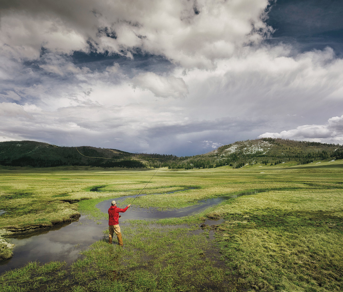 Senator Heinrich fishing the Valles Caldera, a place he helped preserve in 2014.