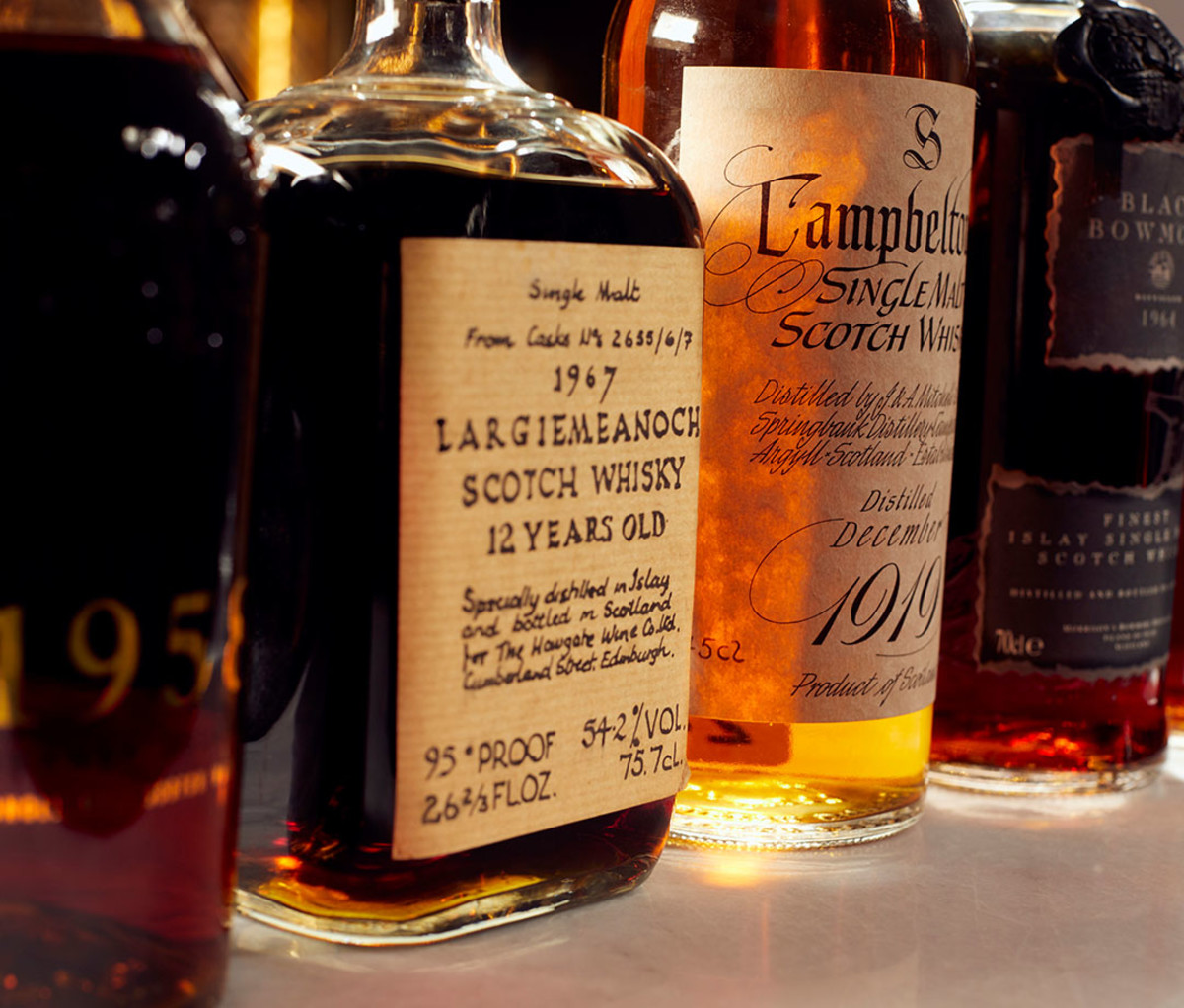 Bottles of Bowmore, Springbank, Black Bowmore, and Ardbeg