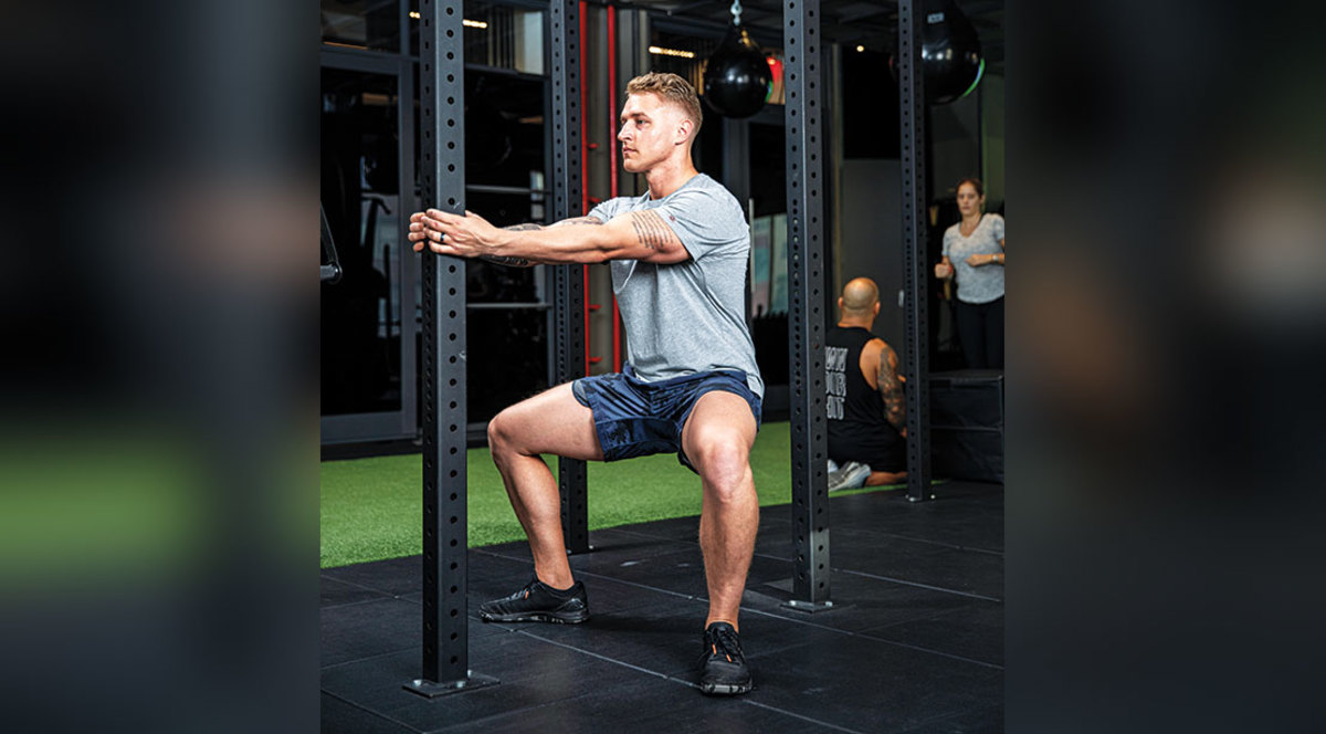 Erik Bartell Performing the Strong Horse Stance Squat