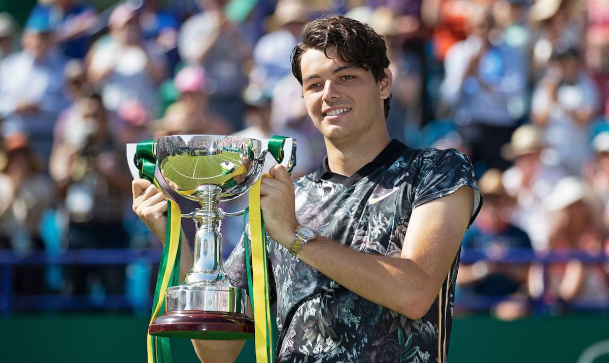 Mandatory Credit: Photo by Sean Ryan/IPS/Shutterstock (10324388b) Taylor Fritz (USA) holds the winners trophy after beating Sam Querrey (USA) in the mens single final. Nature Valley International Tennis, Day 9, Eastbourne, UK, - 29 Jun 2019