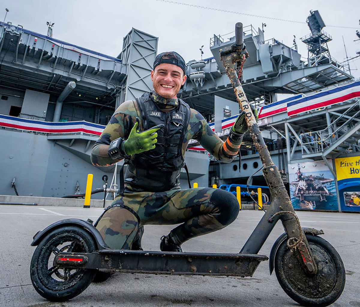 Koehler with a scooter he found while diving with the Navy.