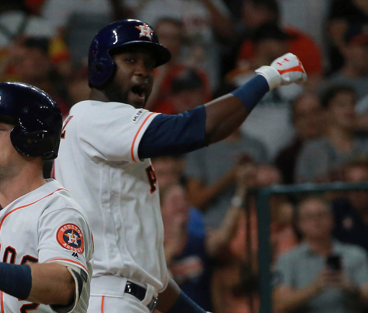 Houston Astros' Yordan Alvarez and Alex Bregman celebrate home run in Houston
