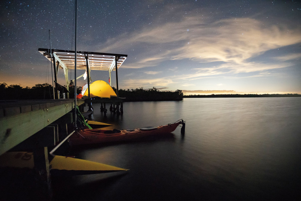 The team sails sea kayaks across the national park, including a night on a chickee tent platform.