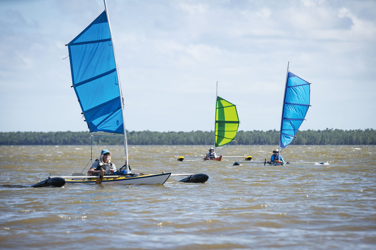 The trio breaks into Whitewater Bay in a 15-knot breeze.
