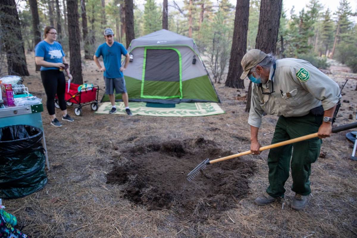 Camping in Holcomb Valley Big Bear campfire ring precaution