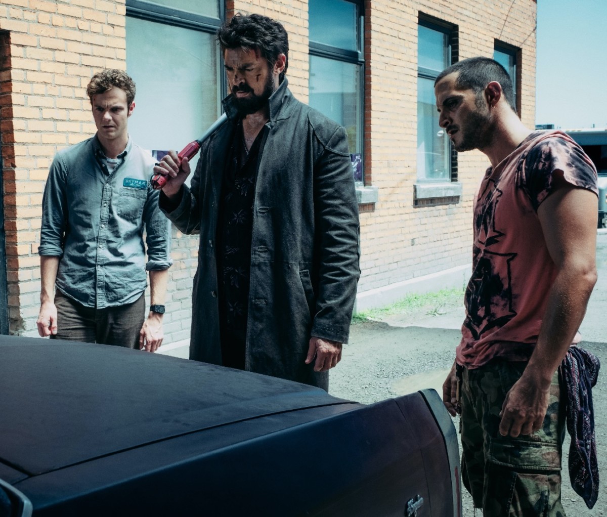Hughie Campbell (Jack Quaid), Billy Butcher (Karl Urban), and Frenchie (Tomer Capon) in season 1 of 'The Boys'