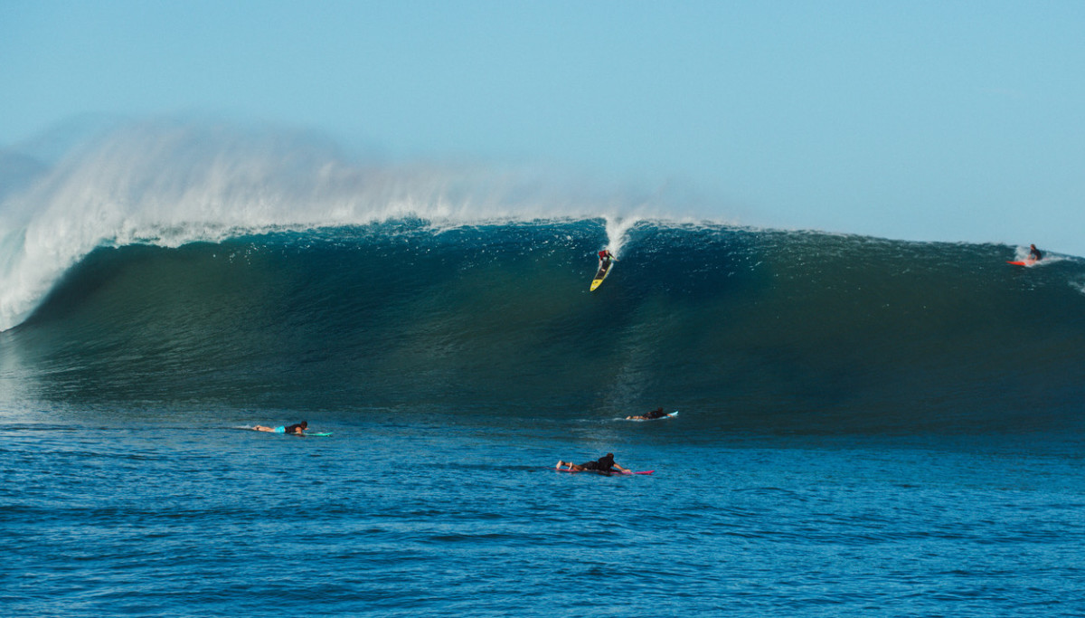 Keala Kennley paddles into a bomb.