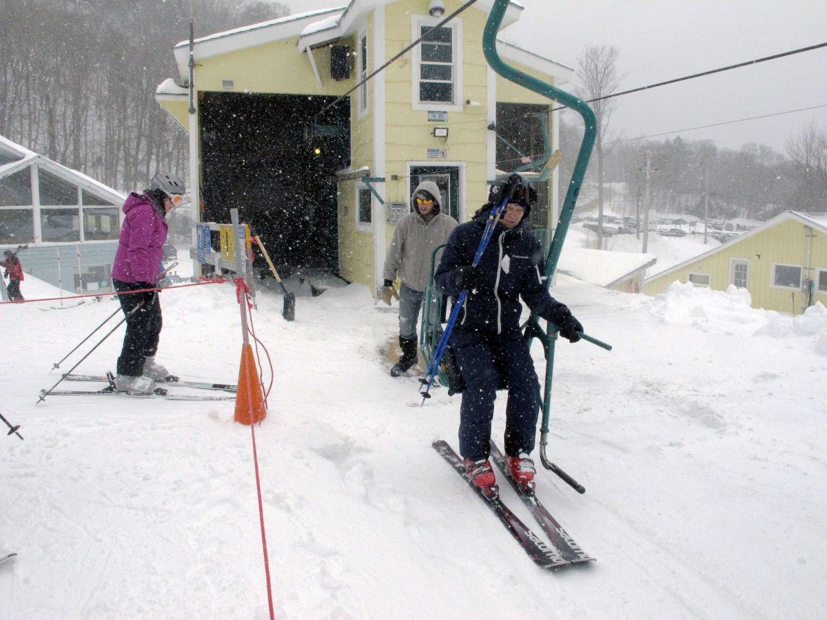 Skiers board the chairlift at Mad River Glen in Fayston, Vt