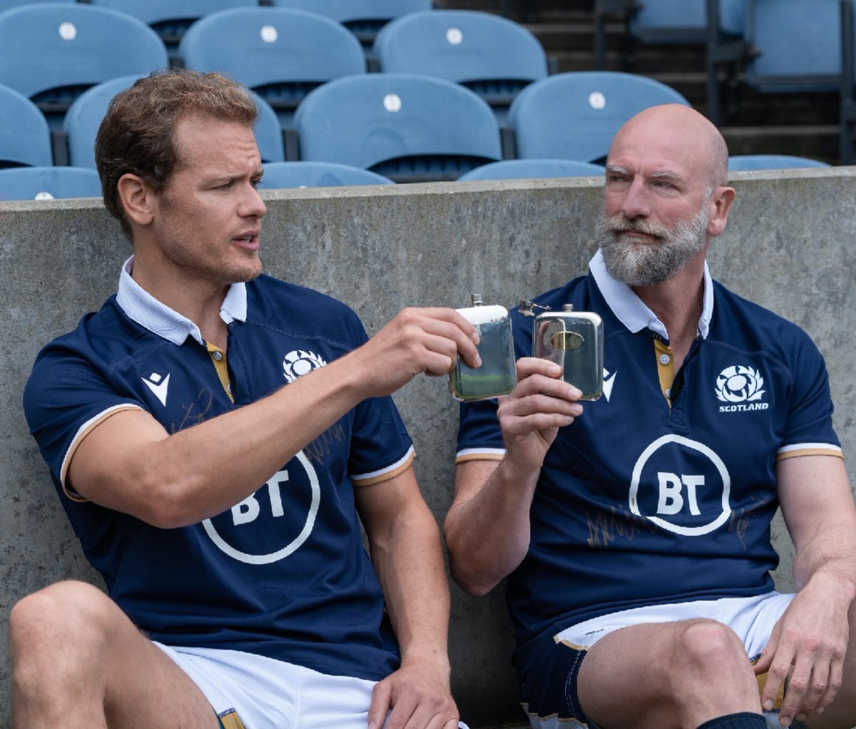 Sam Heughan and Graham McTavish enjoy whisky while filming 'Men in Kilts'