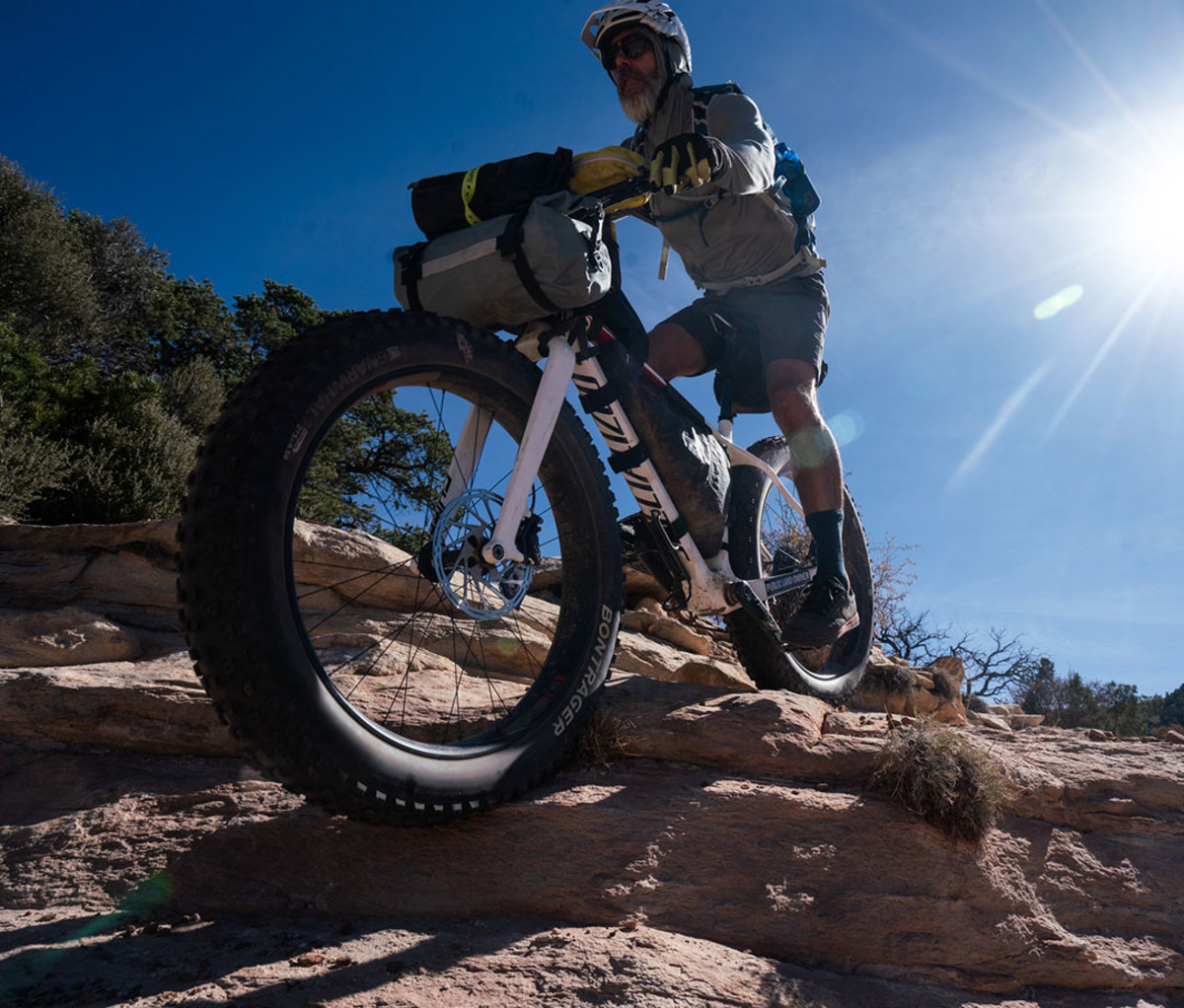 Mountain biker crossing rocky terrain in Bears Ears National Monument
