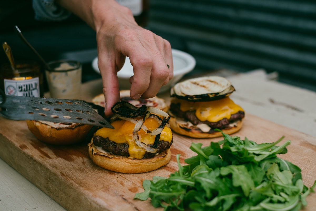 Whiskey burger plated with onions