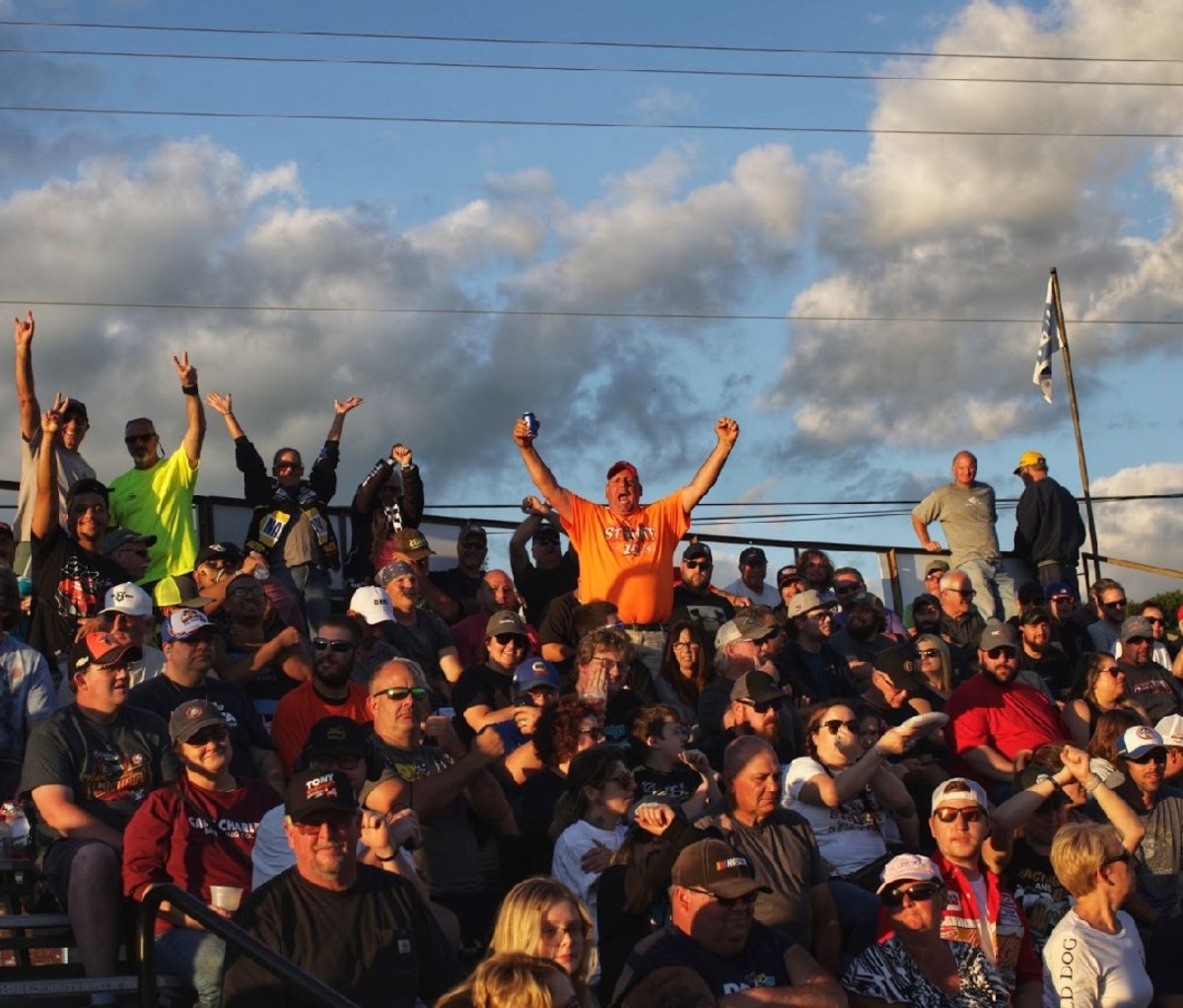 Spectators cheering at Stafford Motor Speedway.