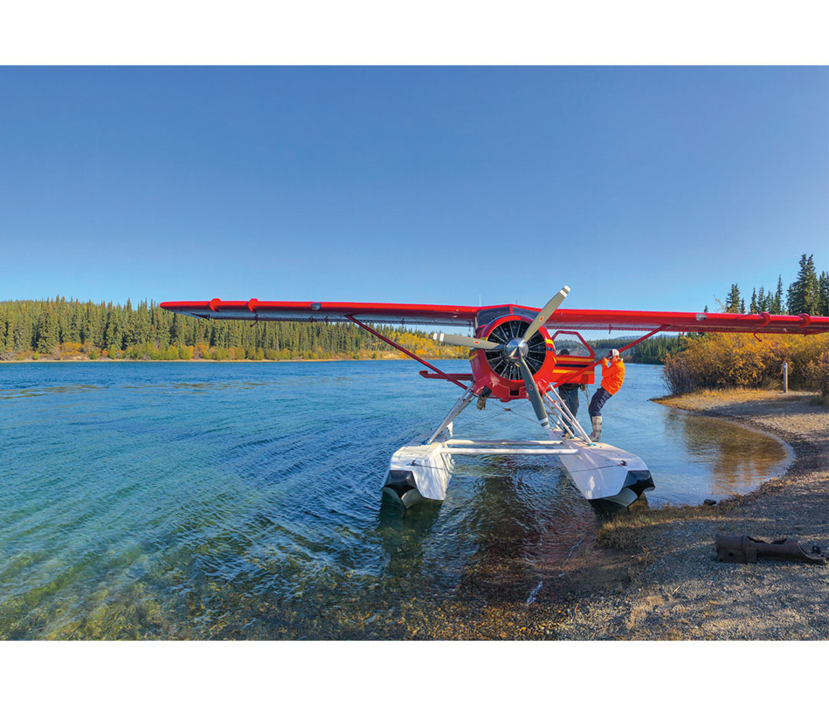 DHC-2 Beaver pontoon plane lifts off Lake Laberge.