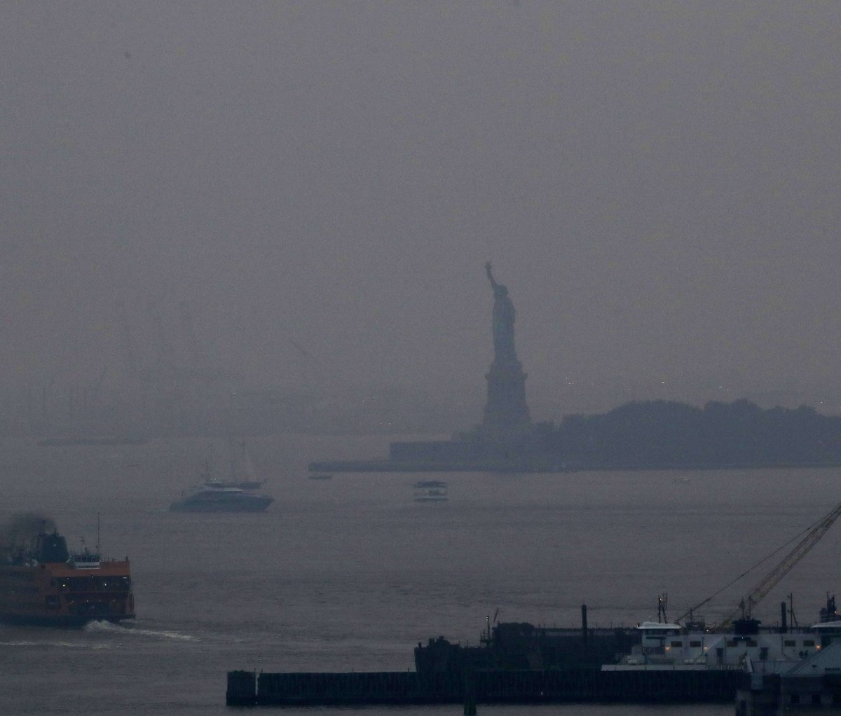 The Statue of Liberty shrouded in smoke from western U.S. wildfires.