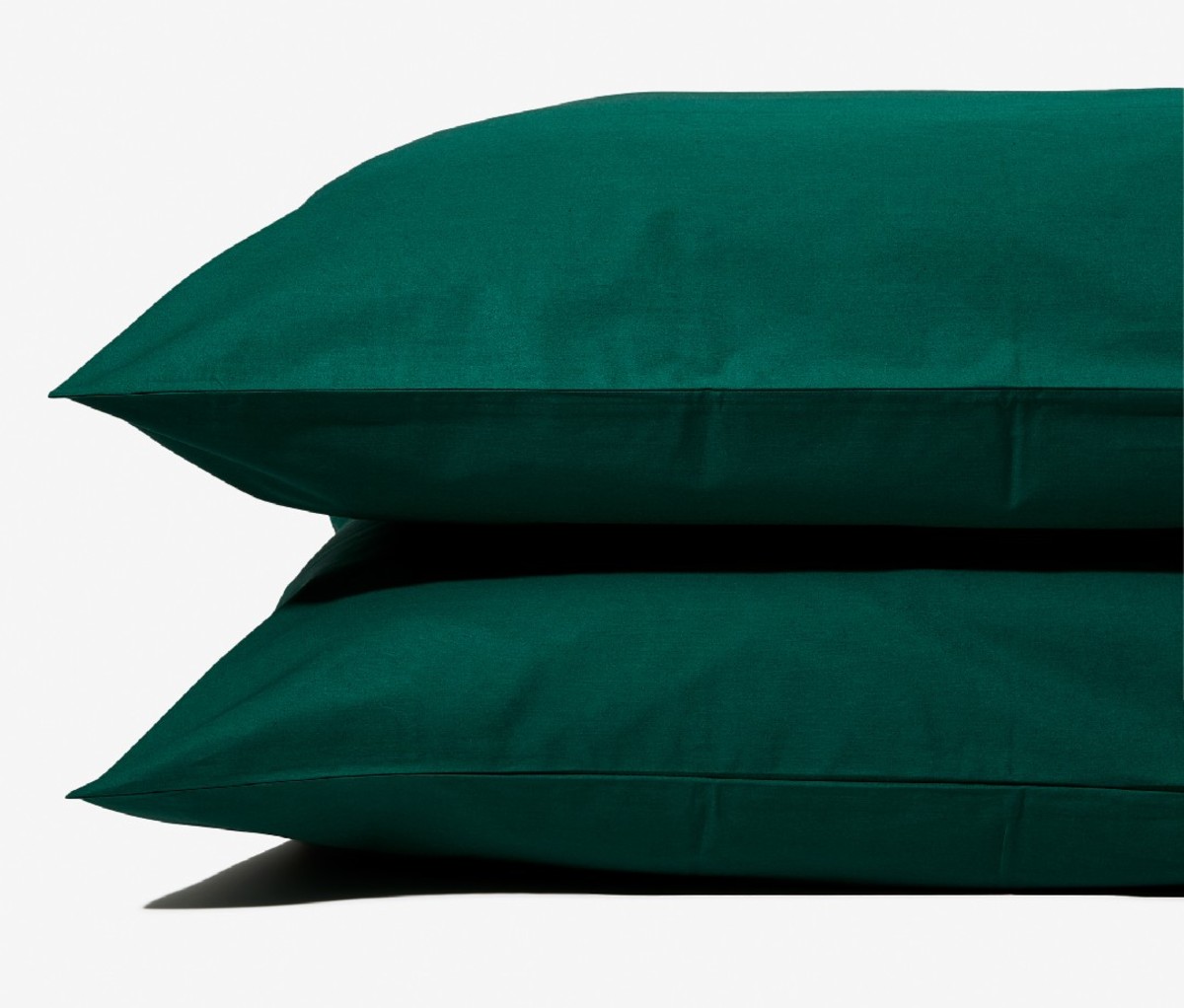 Pillows with covers from the Ash & Fir Percale Sheet Set.
