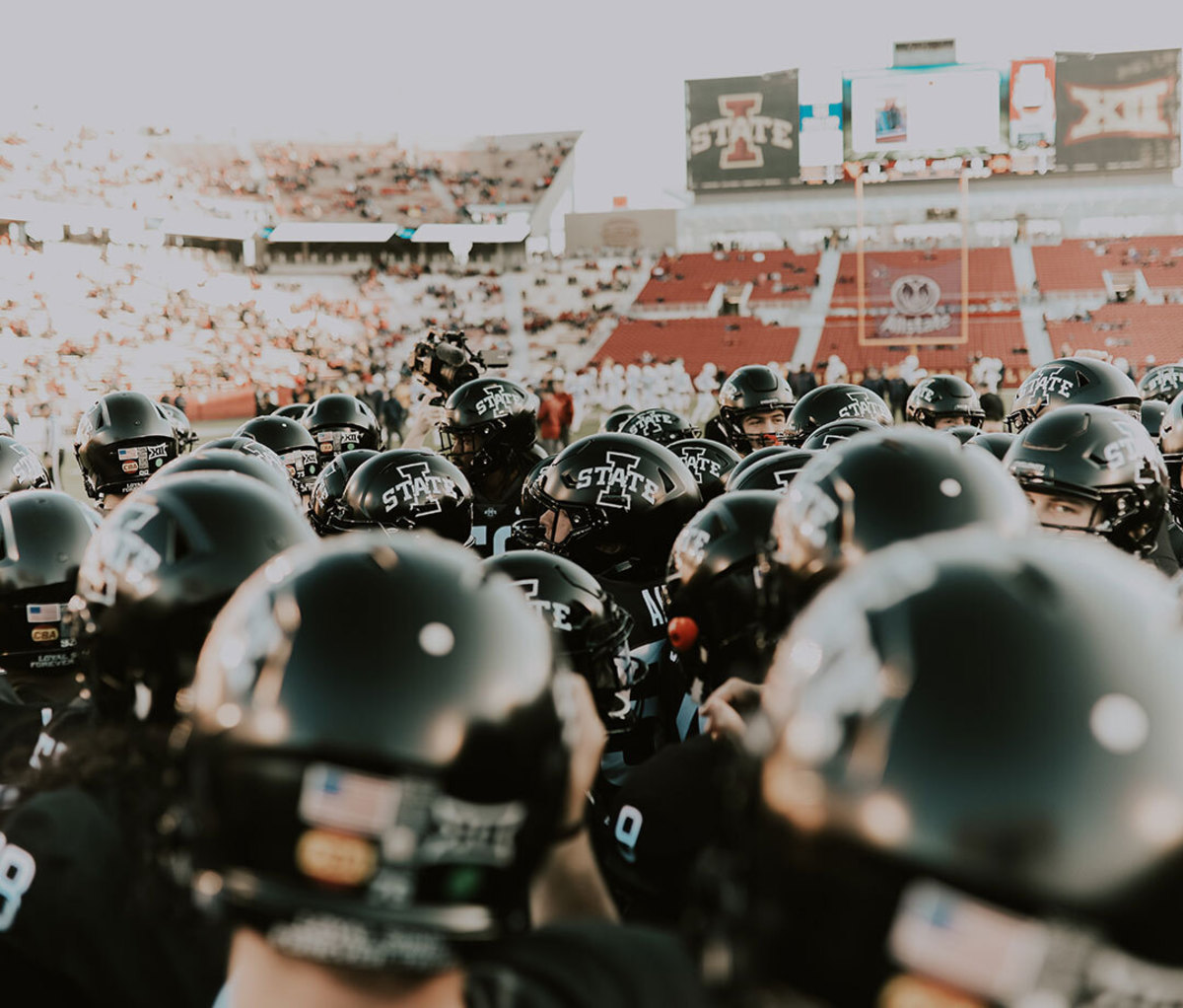 Iowa State college football players in stadium