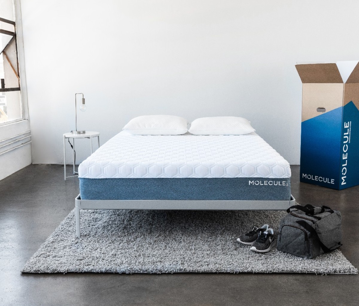 An image of a Molecule 2 AirTEC Mattress With Microban on a bed frame.